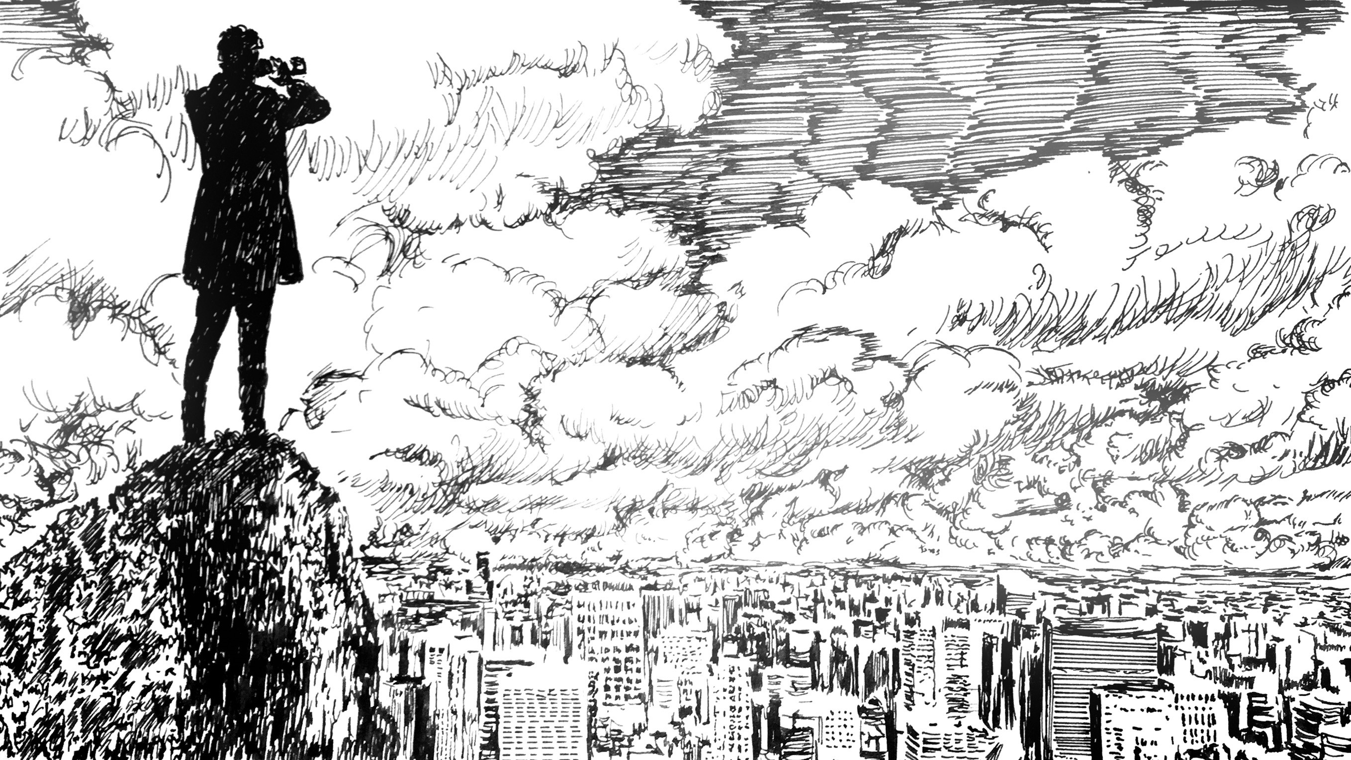 Eine Person steht auf einem Hügel und blickt auf eine Stadt hinab.