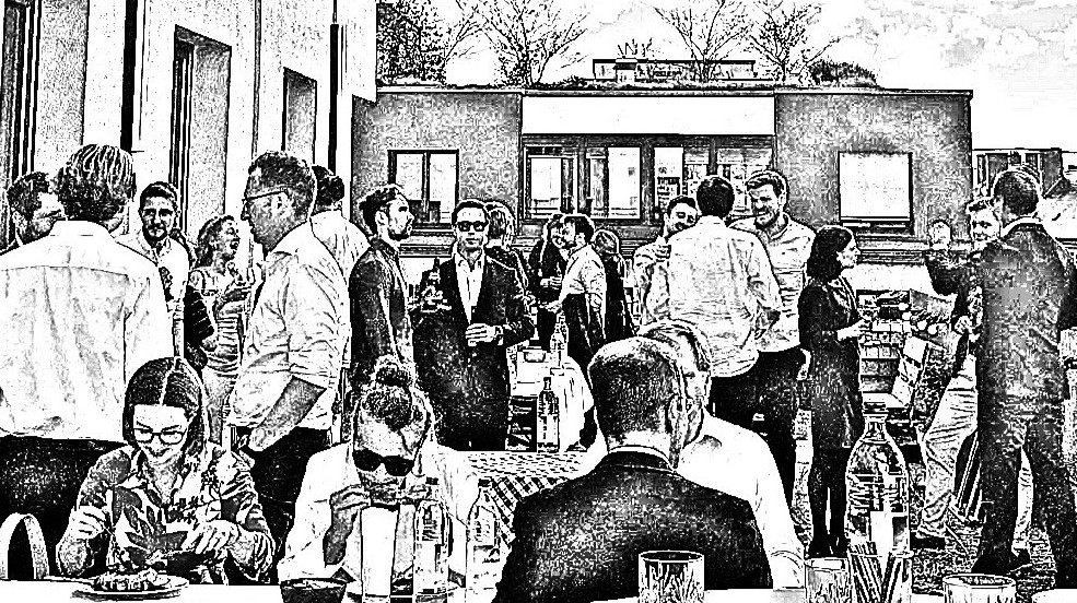 People have a summer party on a roof terrace